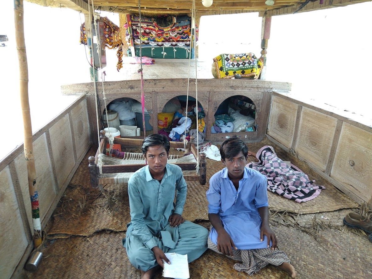 Pakistan&#39;s centuries-old boat village faces dual threat